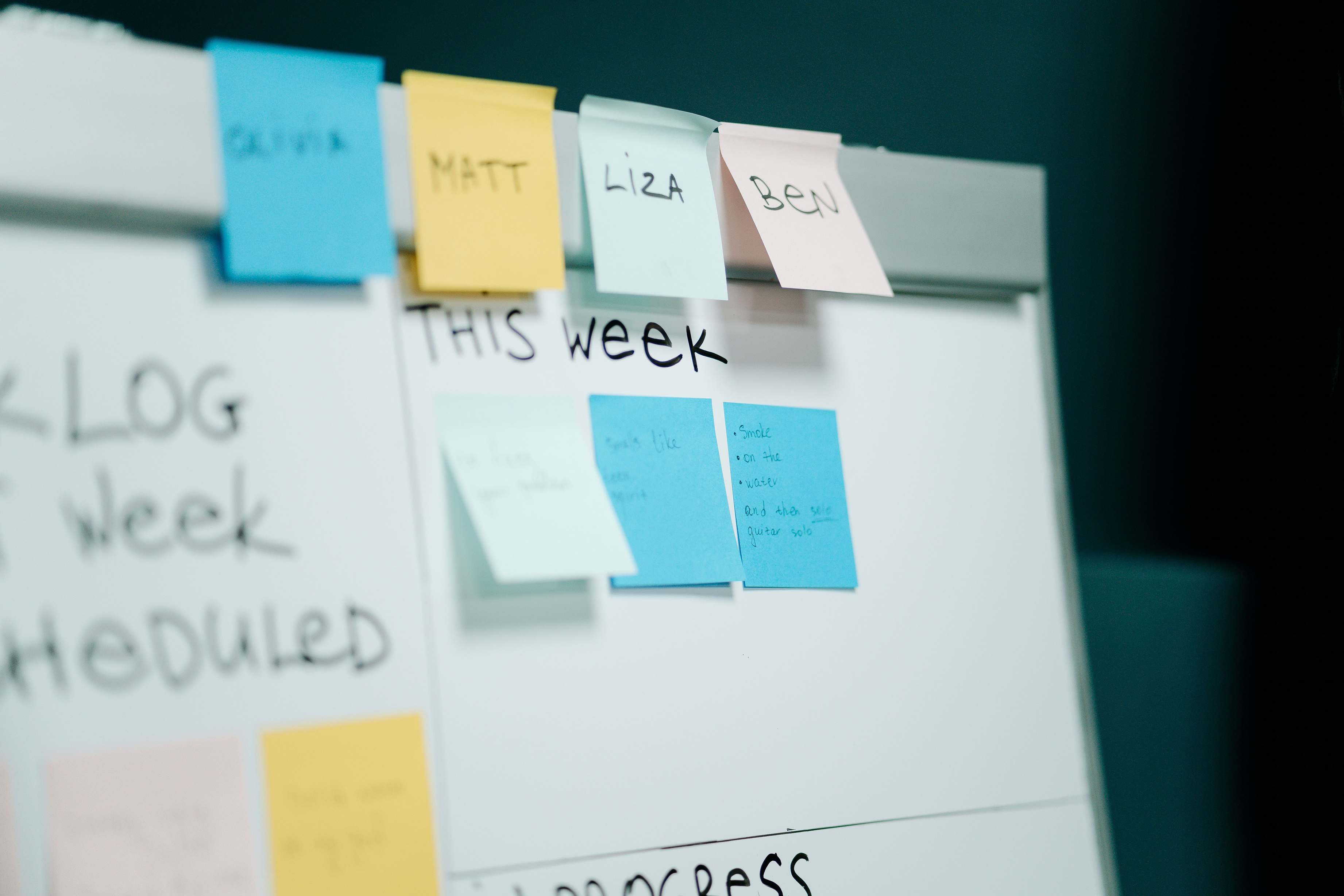 Whiteboard with integration flow sketches and colorful sticky notes